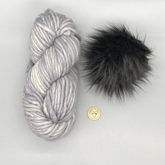 Malabrigo RASTA in colour Cape Cod Grey  with Black faux fur pompom and button